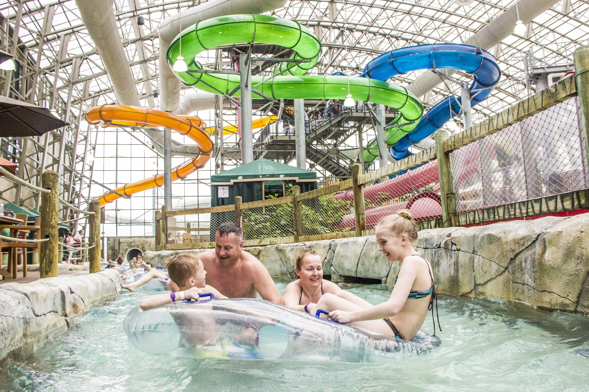 A family enjoys playing in the Jay Peak indoor waterpark